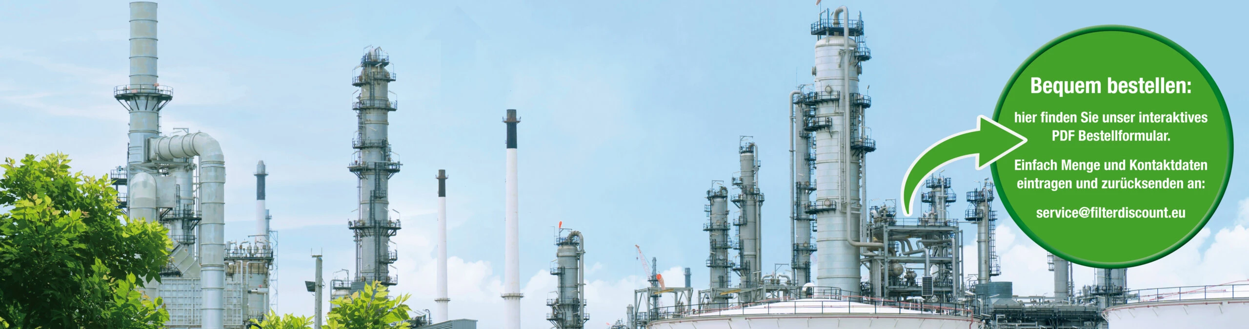Industrielandschaft mit Hinweis auf die neue PDF-Preisliste von FILTERDISCOUNT24
